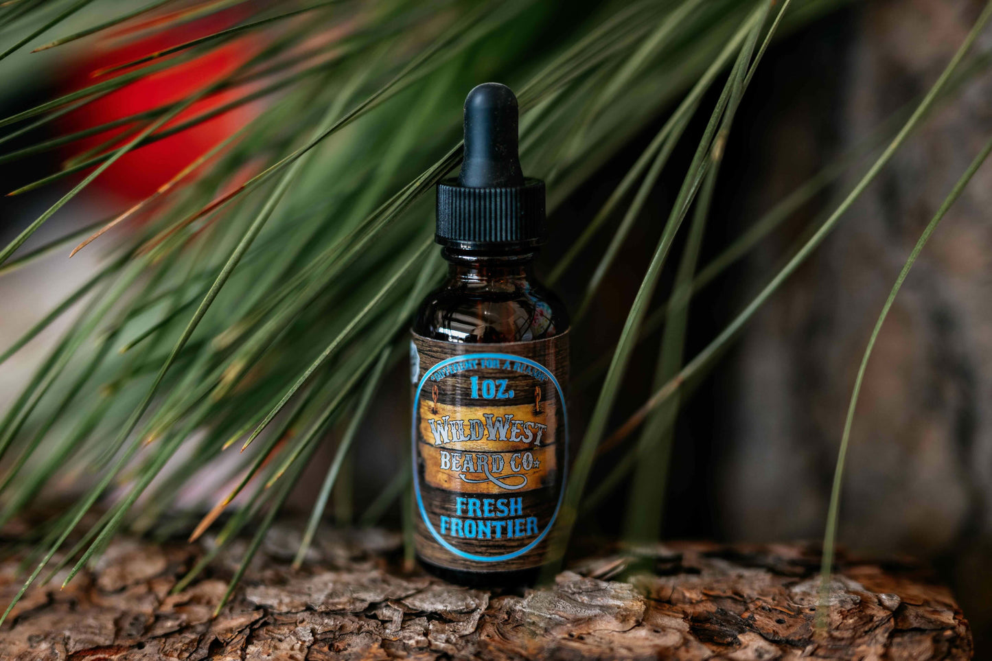 A picture of Fresh Frontier Platinum Beard oil on pine