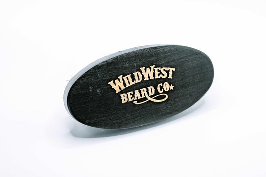 A beech wood boars hair beard brush from Wild West Beard Co.