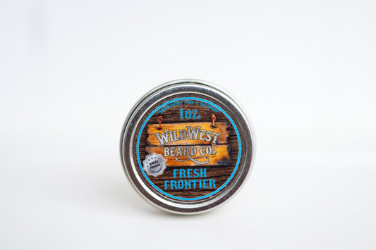 A clean shot of the Fresh Frontier Platinum all natural beard balm tin