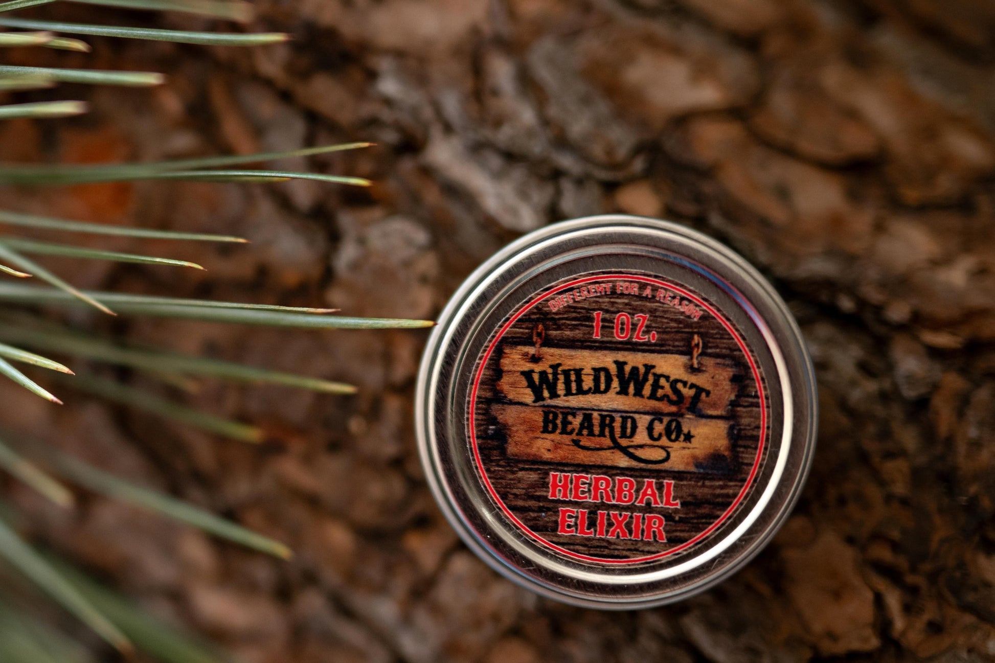 a picture of Herbal Elixir natural beard Balm on pine bark