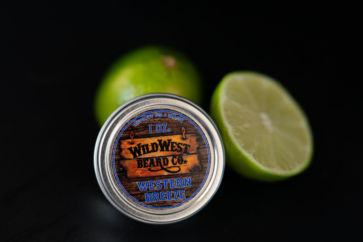 A picture of Western Breeze Natural Beard Balm with a lime in the background